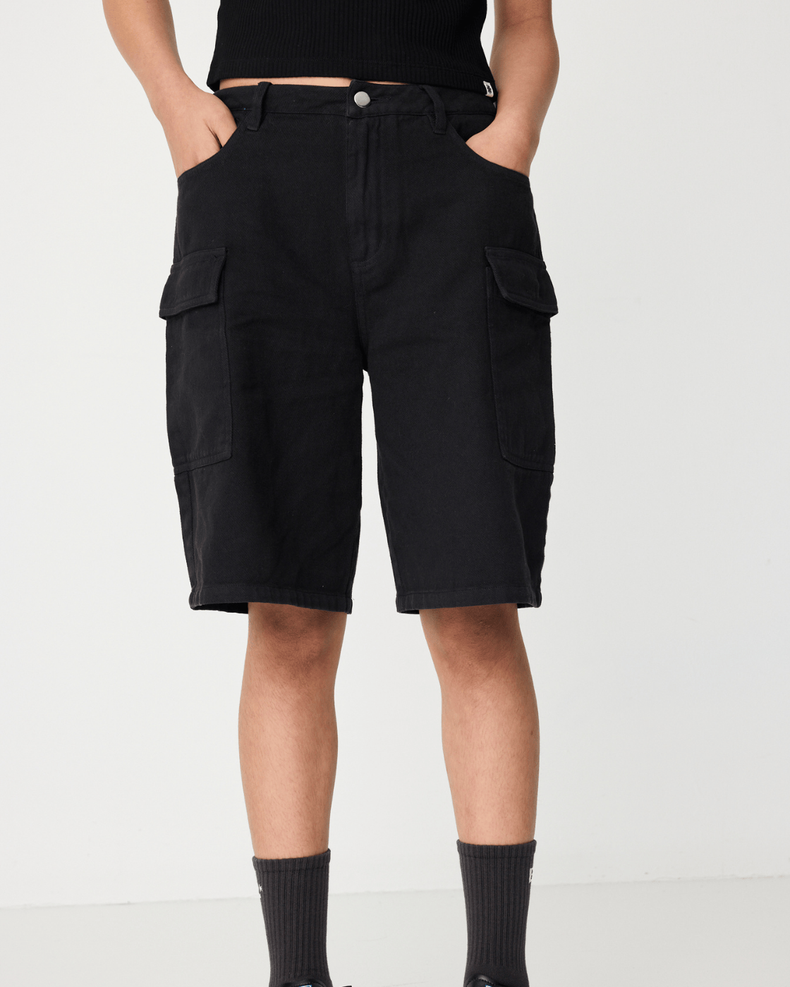 Black Cargo jorts close up