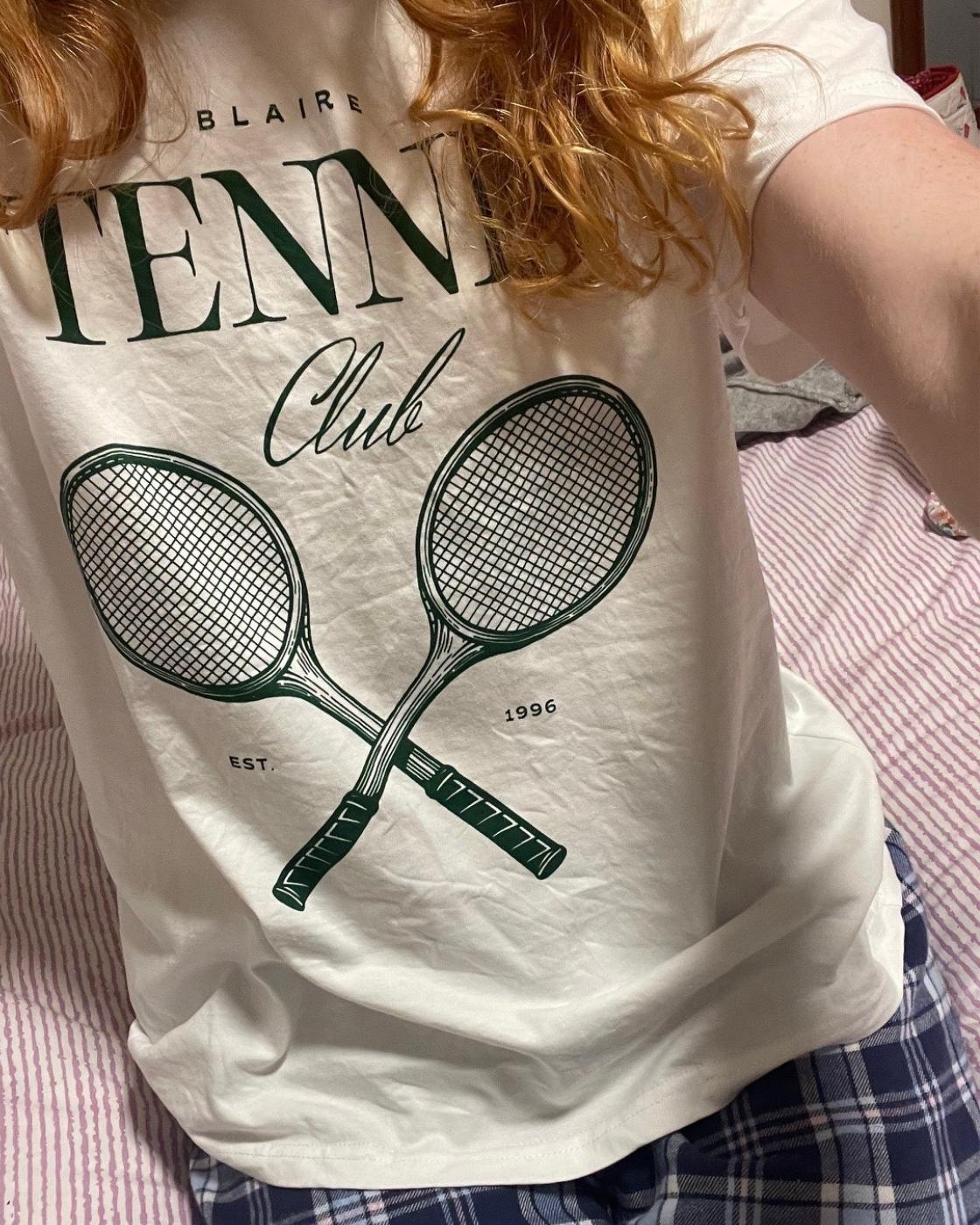 Customer taking a selfie in the Blaire Tennis Club Tee, doubling up as comfy pyjama top!