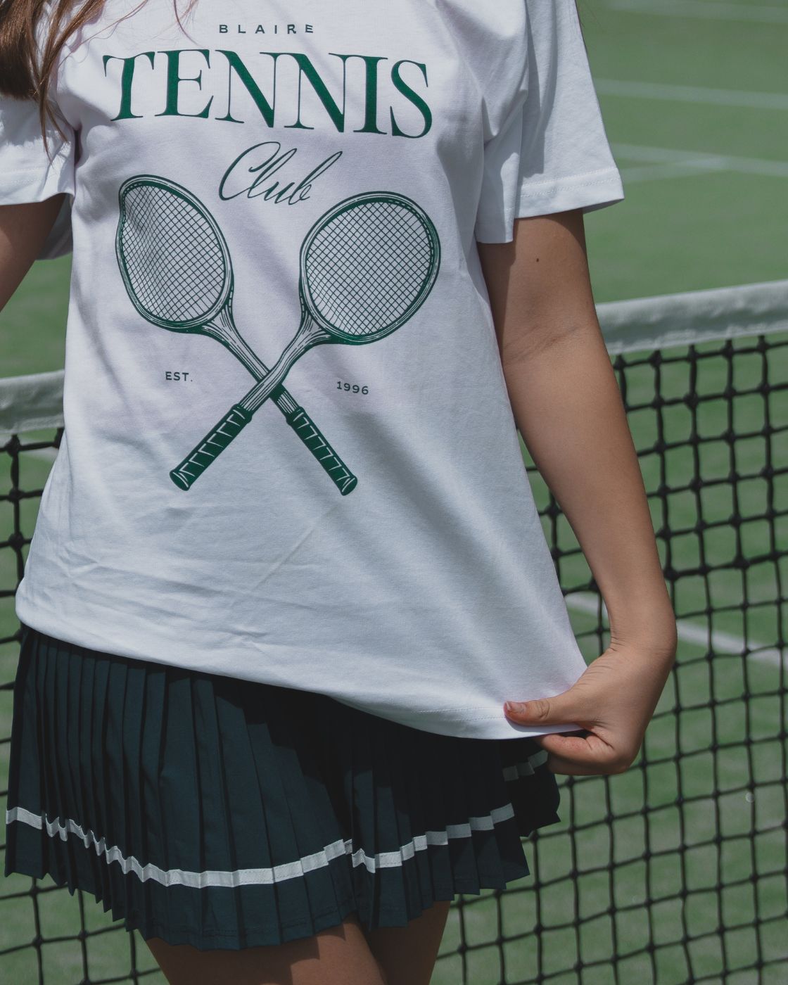 Detailed close-up of the bottom half of the Blaire Tennis Club Tee showing fit, softness and breathability 